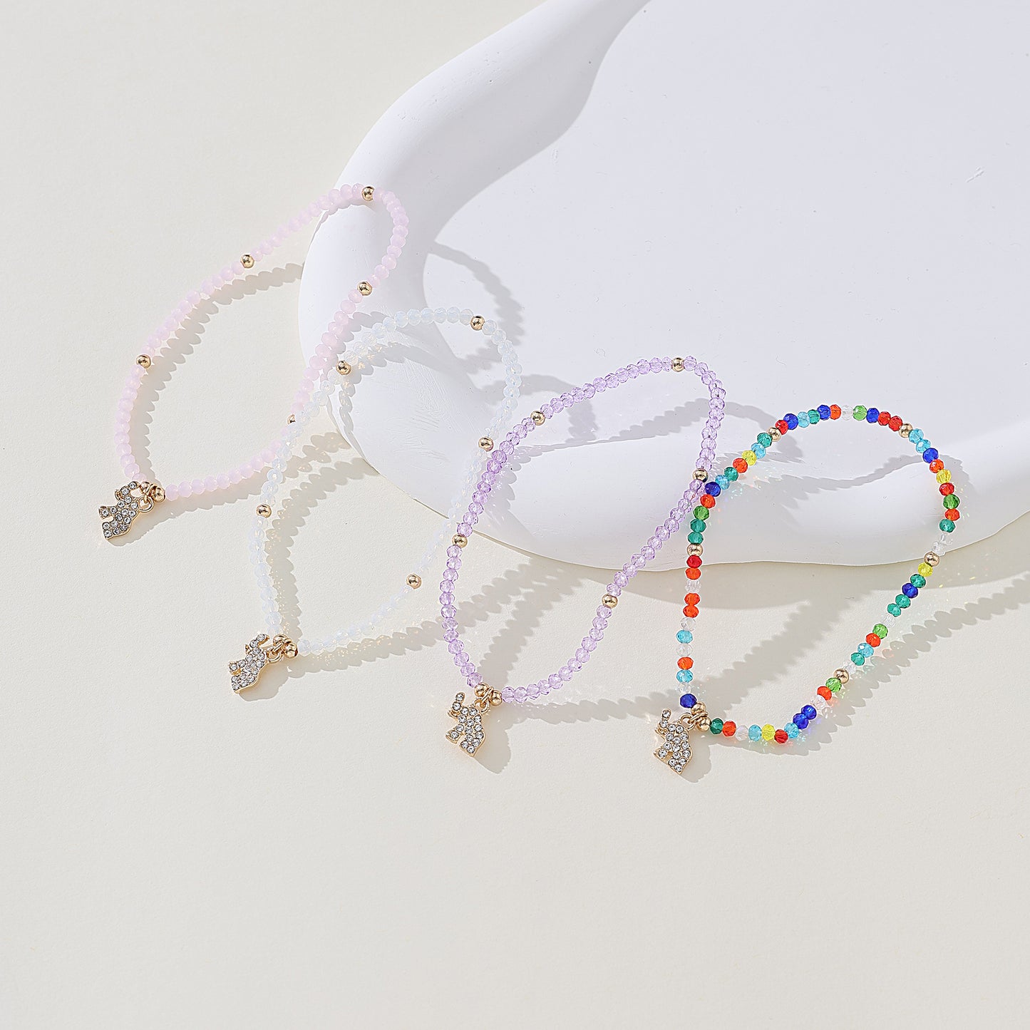 Chic Assorted Beaded Bracelets with Sparkling Crystal Elephant Charms - Perfect for Layering and Gifting