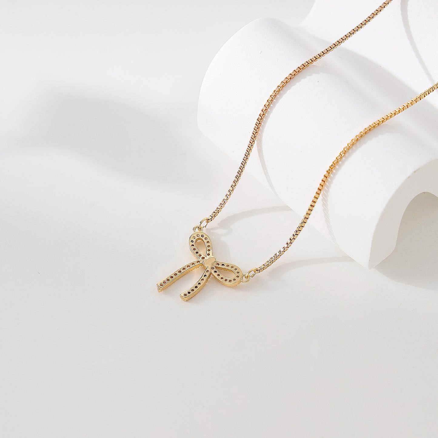 Golden and Crystal Bow Necklace