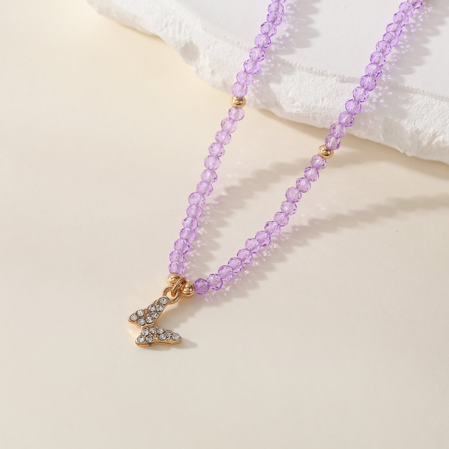 Assorted Pastel Beaded Necklace with Gold & Crystal Butterfly Charm - Elegant & Stylish Jewelry for Women