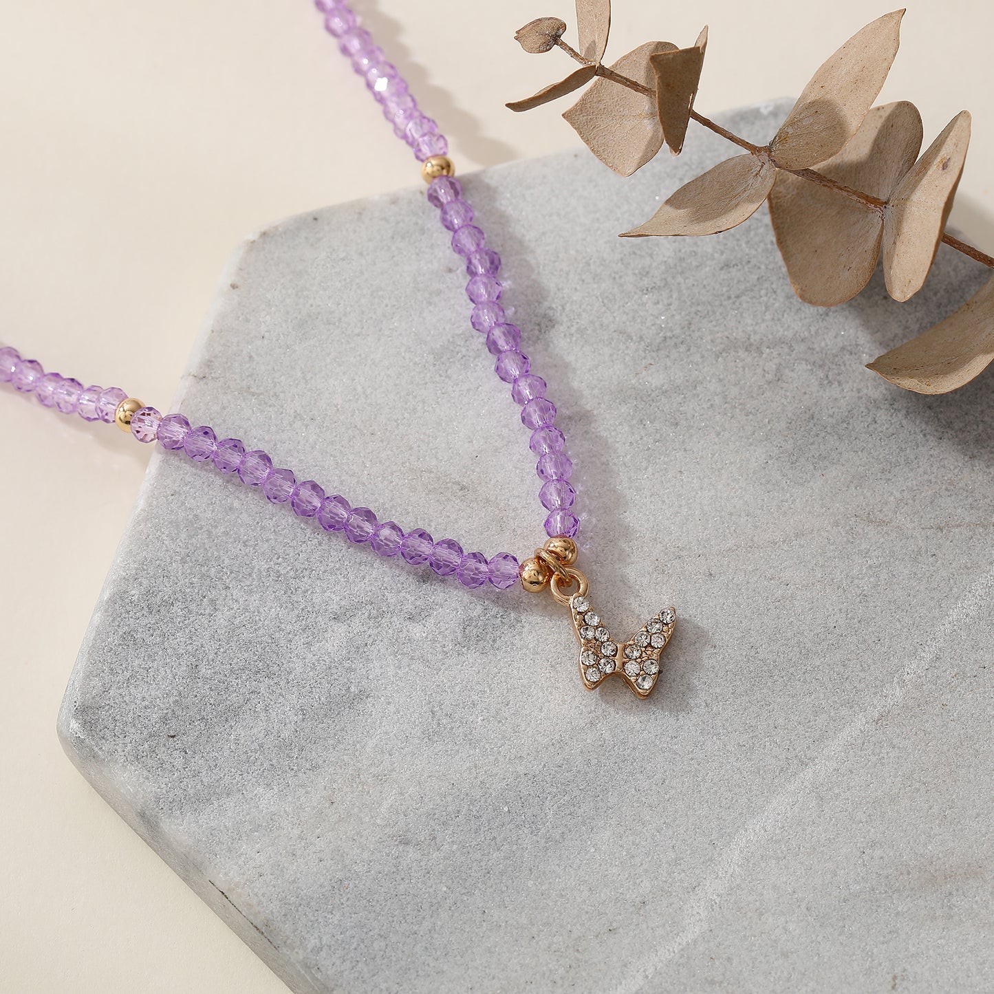 Assorted Pastel Beaded Necklace with Gold & Crystal Butterfly Charm - Elegant & Stylish Jewelry for Women