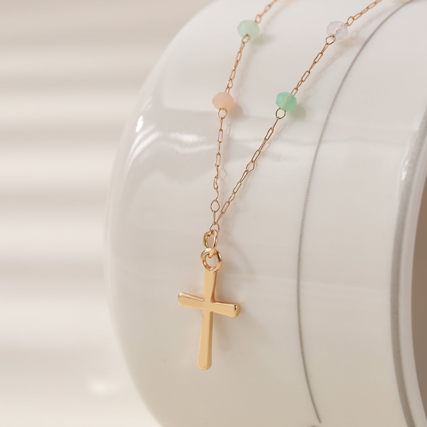 Delicate Gold Chain Necklace with Gold Cross & Assorted Faceted Beads - Elegant & Versatile Jewelry for Women