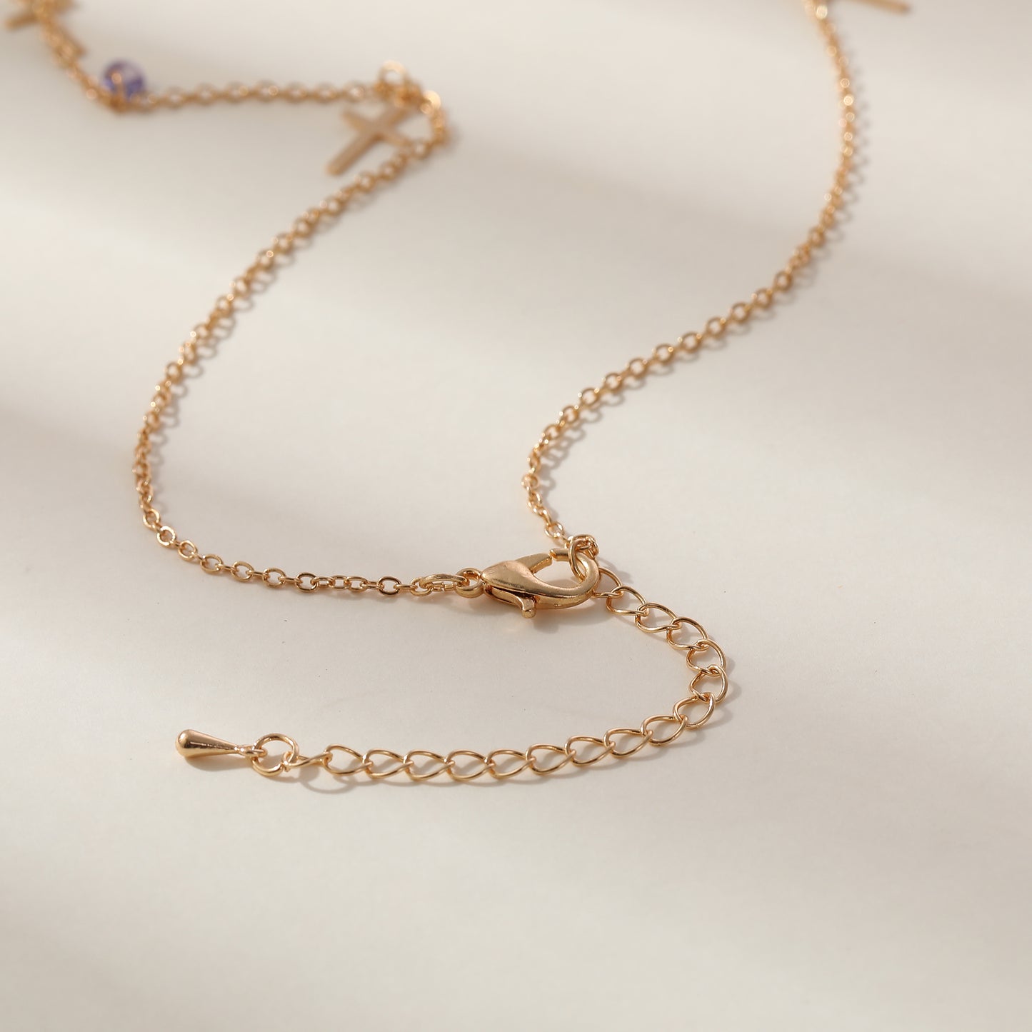 Stylish Gold Chain Necklace with Small Crosses & Assorted Crystal Dangles - Elegant Everyday Jewelry for Women - Perfect for Casual or Formal Outfits
