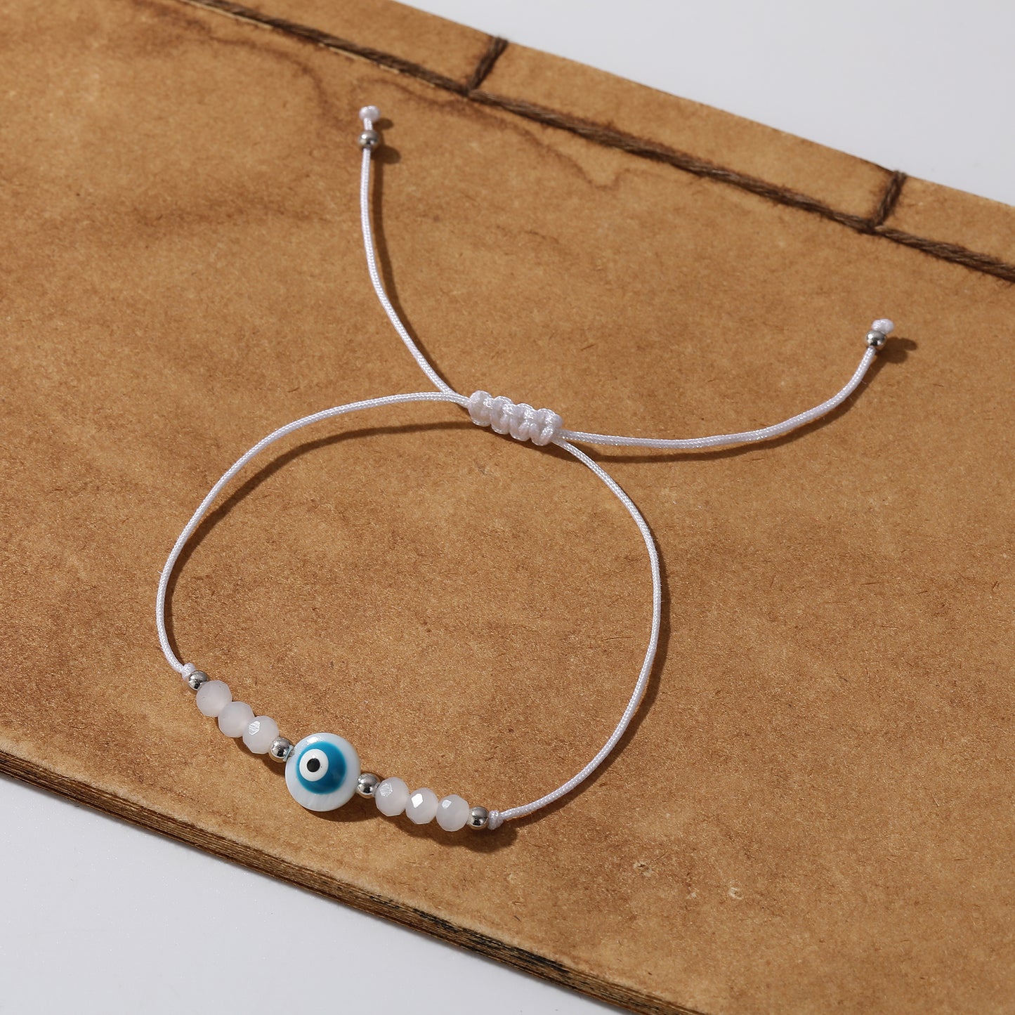 Assorted Adjustable String Lucky Eye Bead Bracelets - Protection & Style in Black, Blue, Pink & White