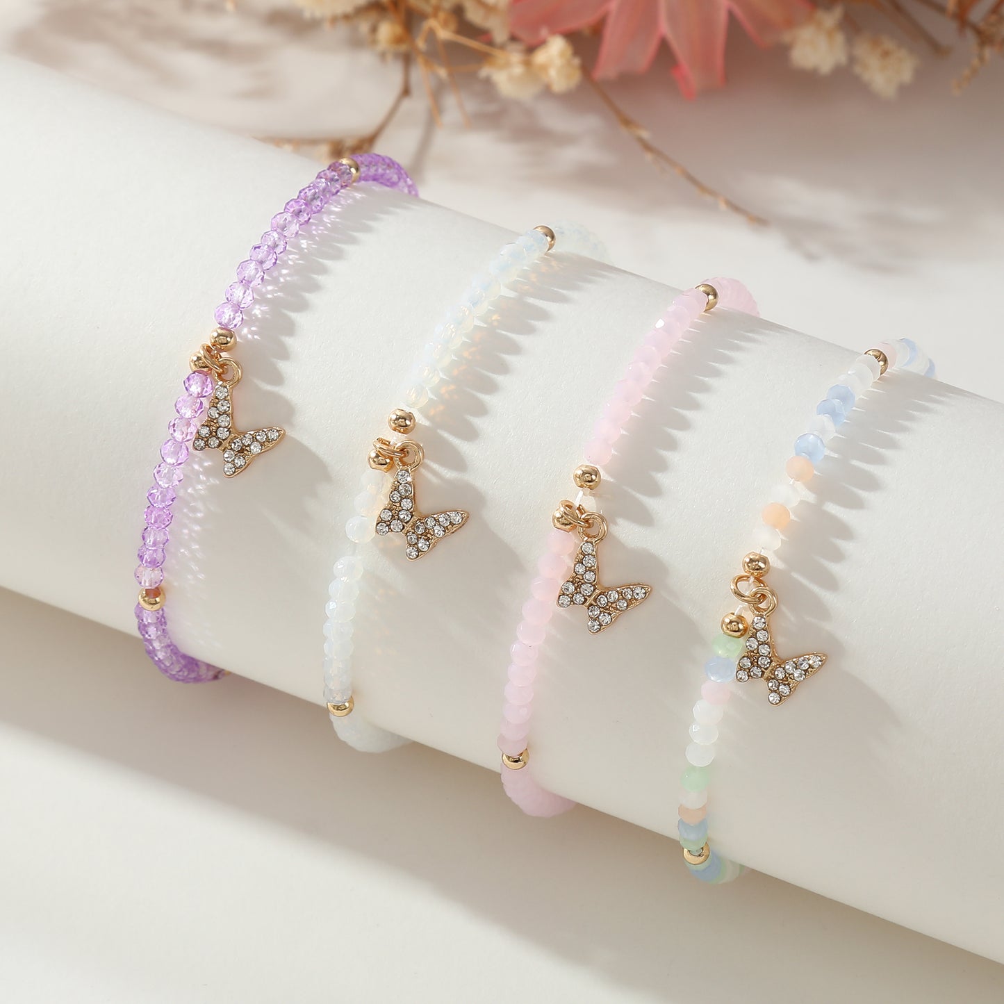 Assorted Beaded Bracelet with Small Crystal Butterfly Charm - Delicate and Sparkling Jewelry for Women, Perfect Gift