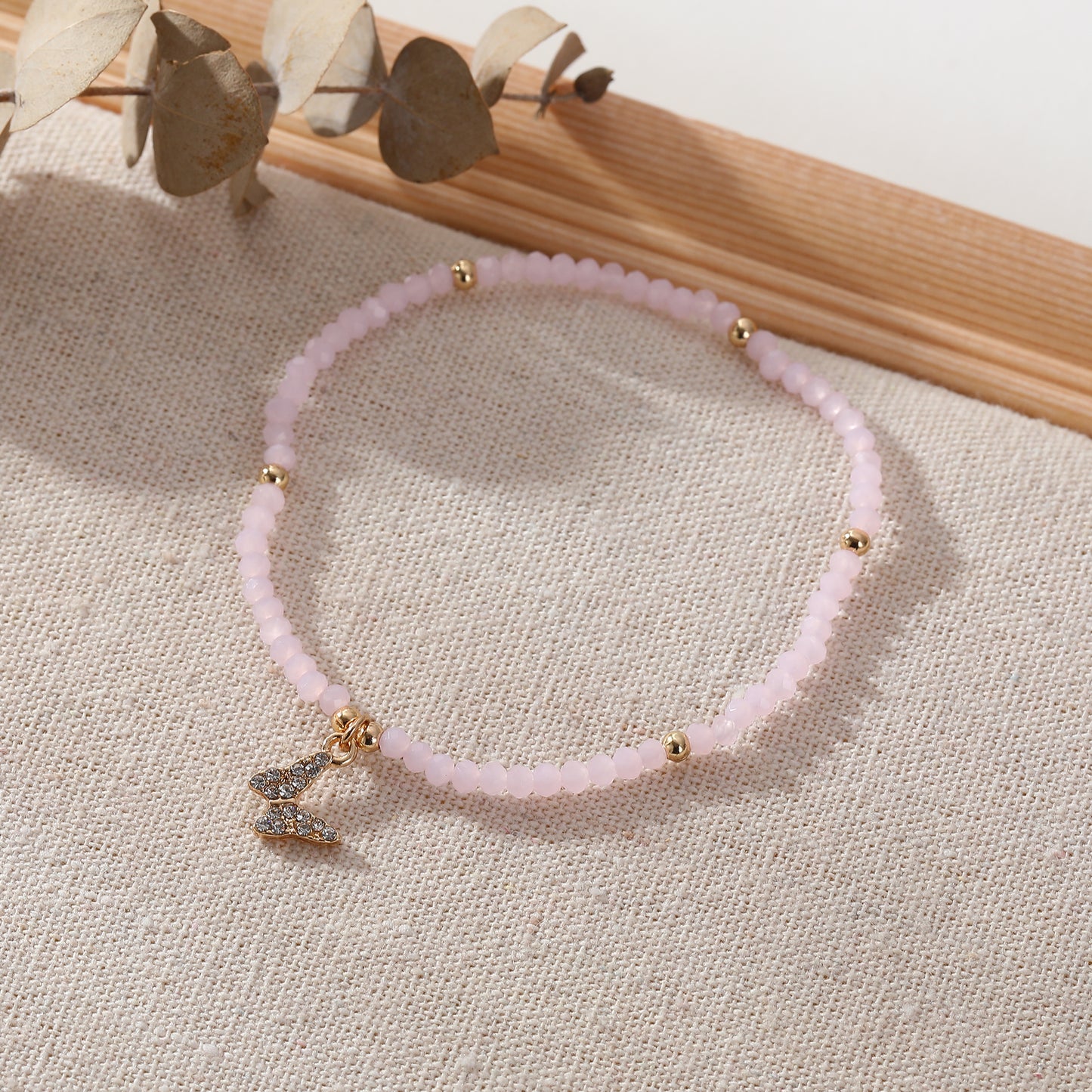 Assorted Beaded Bracelet with Small Crystal Butterfly Charm - Delicate and Sparkling Jewelry for Women, Perfect Gift