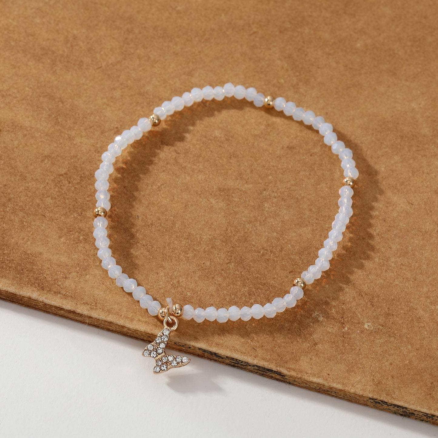 Assorted Beaded Bracelet with Small Crystal Butterfly Charm - Delicate and Sparkling Jewelry for Women, Perfect Gift